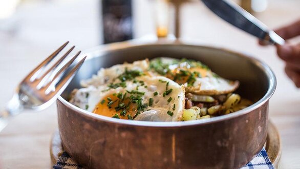 Fried potato with fried egg